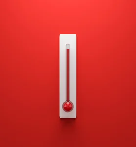 a thermometer with red liquid