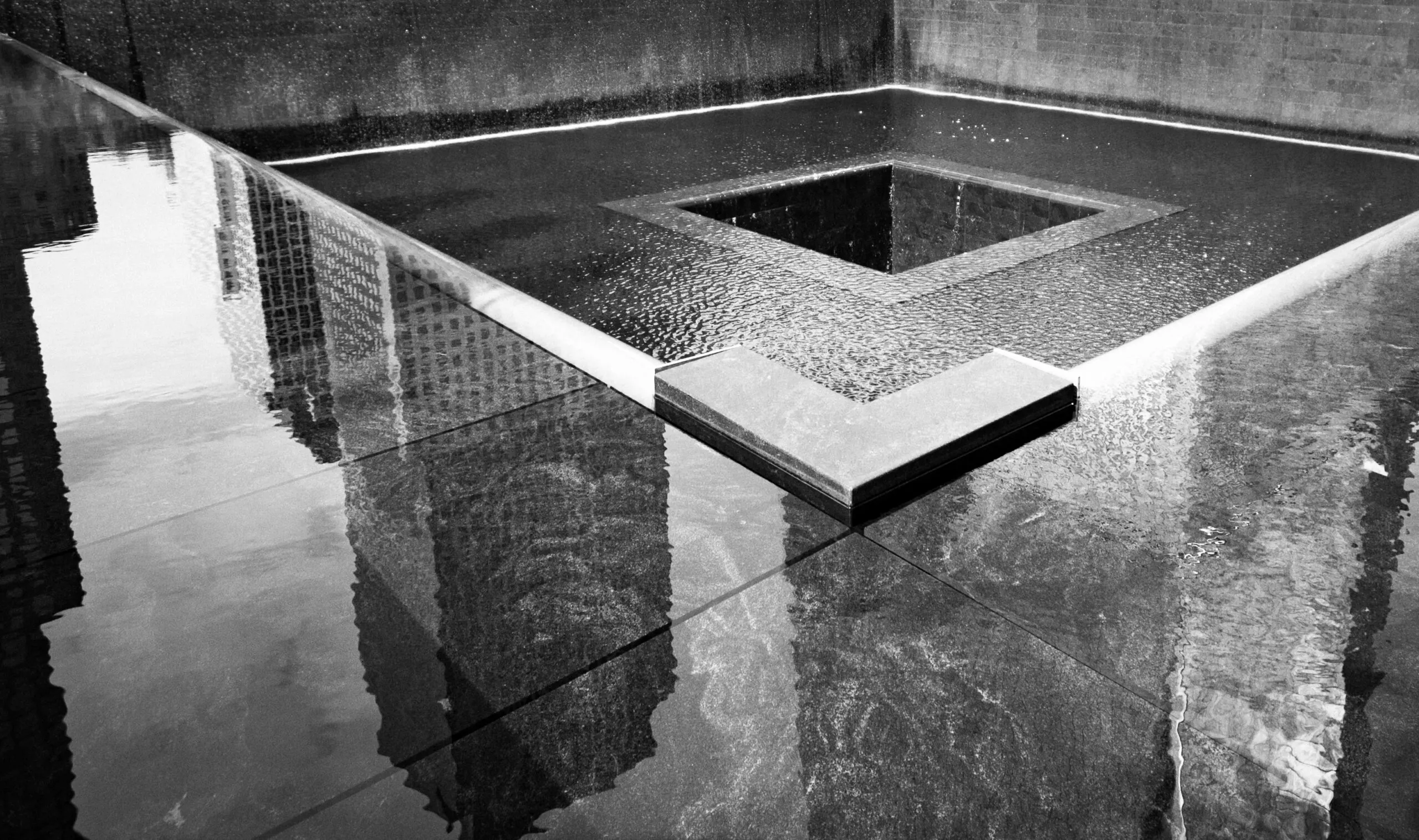 An image of wet concrete tiles