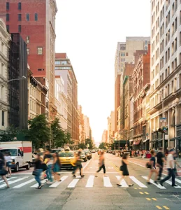 A view of people walking a crosswalk