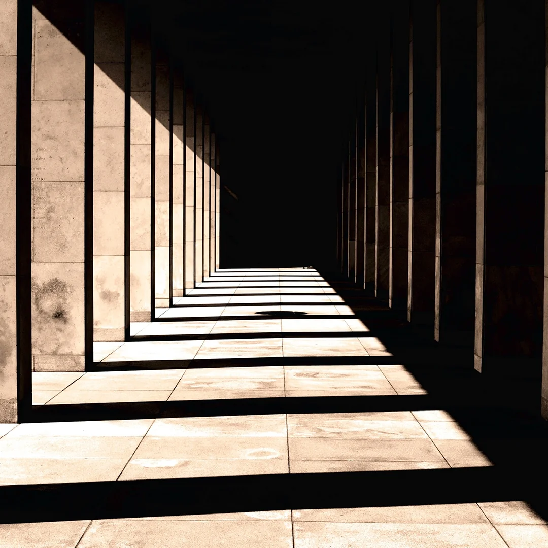 Hallway with light and lines of shadows