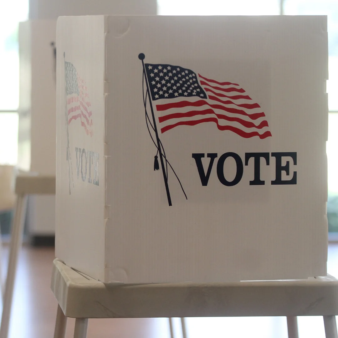 A box with a flag and the word "Vote" on it